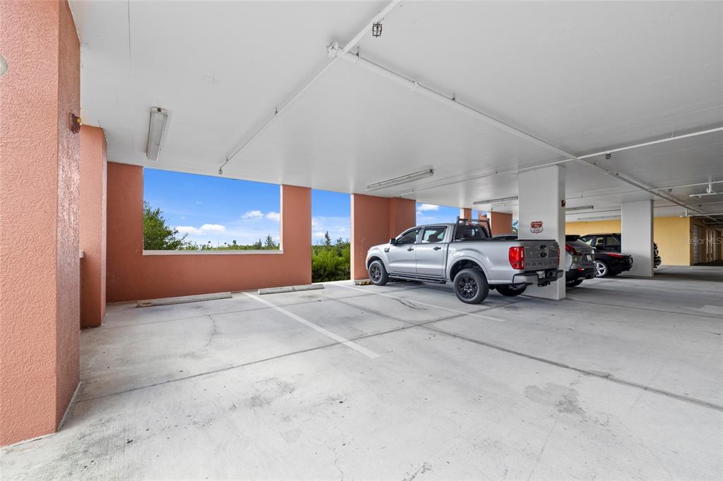 615 Riviera Dunes Way, Unit 204 Palmetto, FL 34221 - Photo 36 of 43 a view of a car garage
