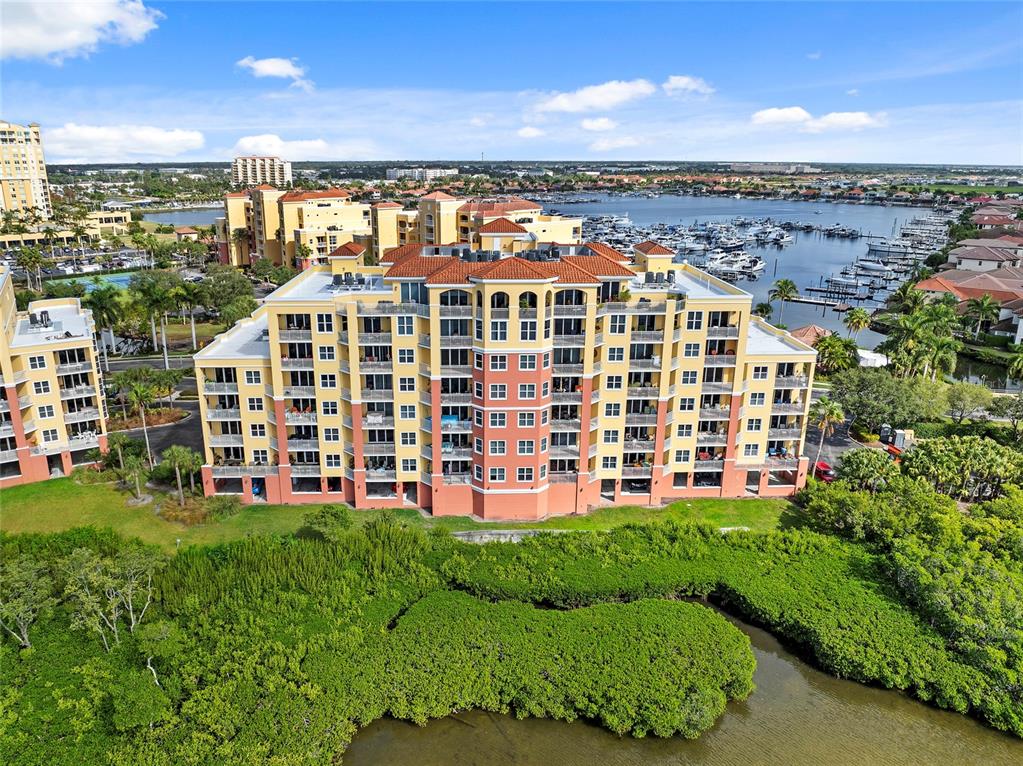 615 Riviera Dunes Way, Unit 204 Palmetto, FL 34221 - Photo 37 of 43 a view of a large building with a view of a building