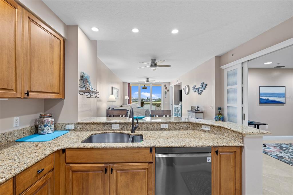615 Riviera Dunes Way, Unit 204 Palmetto, FL 34221 - Photo 8 of 43 a kitchen with a sink and cabinets