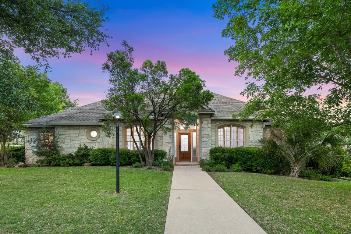 This beautiful home is on a large corner lot off Lakeway Blvd.