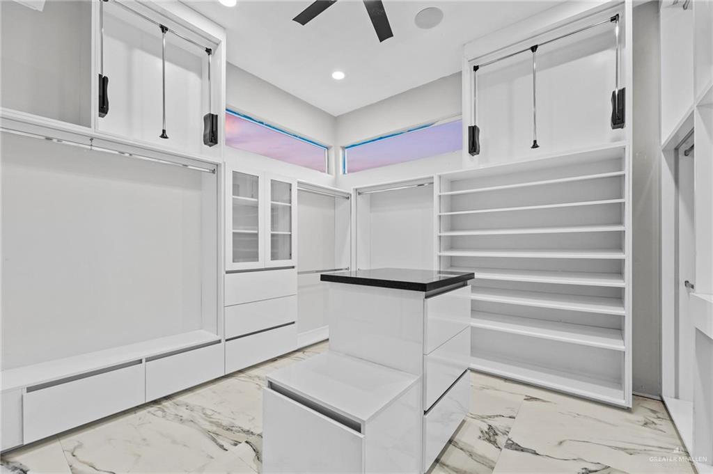 2321 Martha's Lane Mission, TX 78573 - Photo 19 of 36 Walk in closet featuring ceiling fan