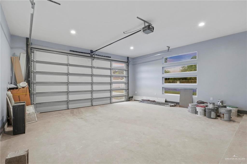 2321 Martha's Lane Mission, TX 78573 - Photo 30 of 36 Garage featuring a garage door opener