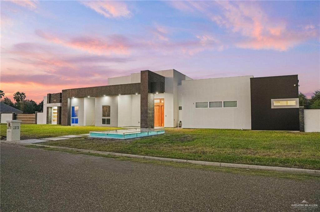 2321 Martha's Lane Mission, TX 78573 - Photo 3 of 36 View of outdoor building at dusk