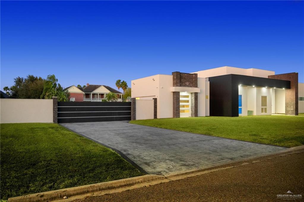 2321 Martha's Lane Mission, TX 78573 - Photo 4 of 36 View of front of property with a yard