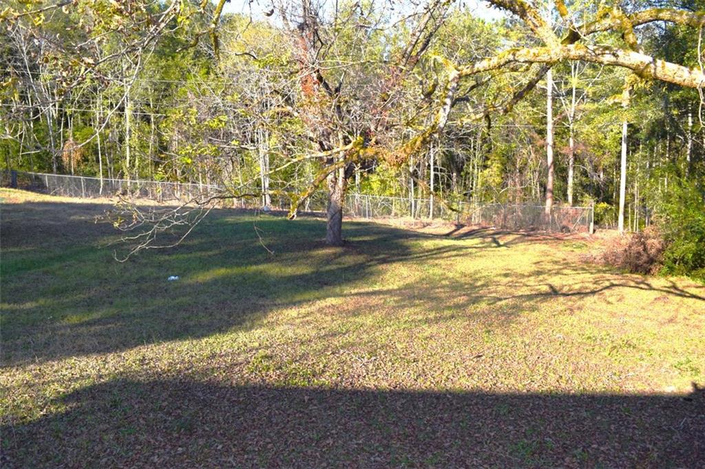 705 Triune Mill Road Thomaston, GA 30286 - Photo 34 of 39 a view of yard with large trees