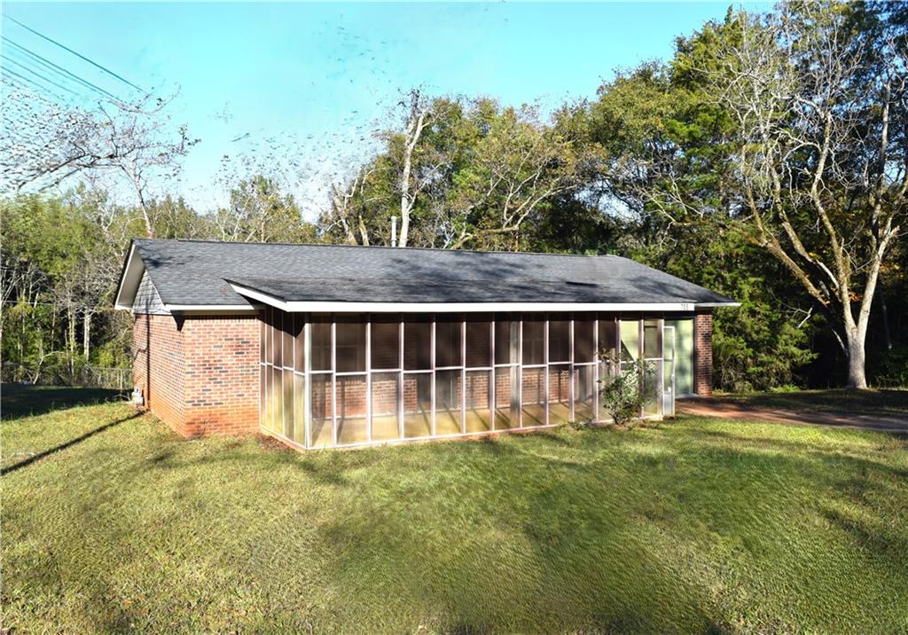 705 Triune Mill Road Thomaston, GA 30286 - Photo 38 of 39 a view of a house with backyard and garden