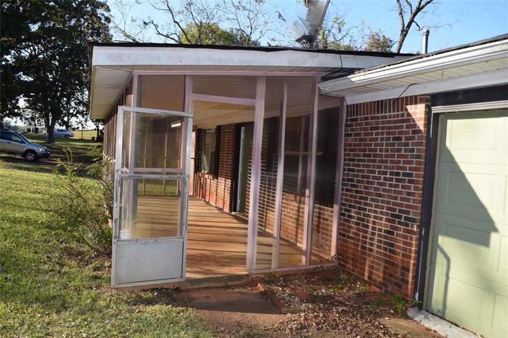 705 Triune Mill Road Thomaston, GA 30286 - Photo 10 of 39 a view of a house with a door