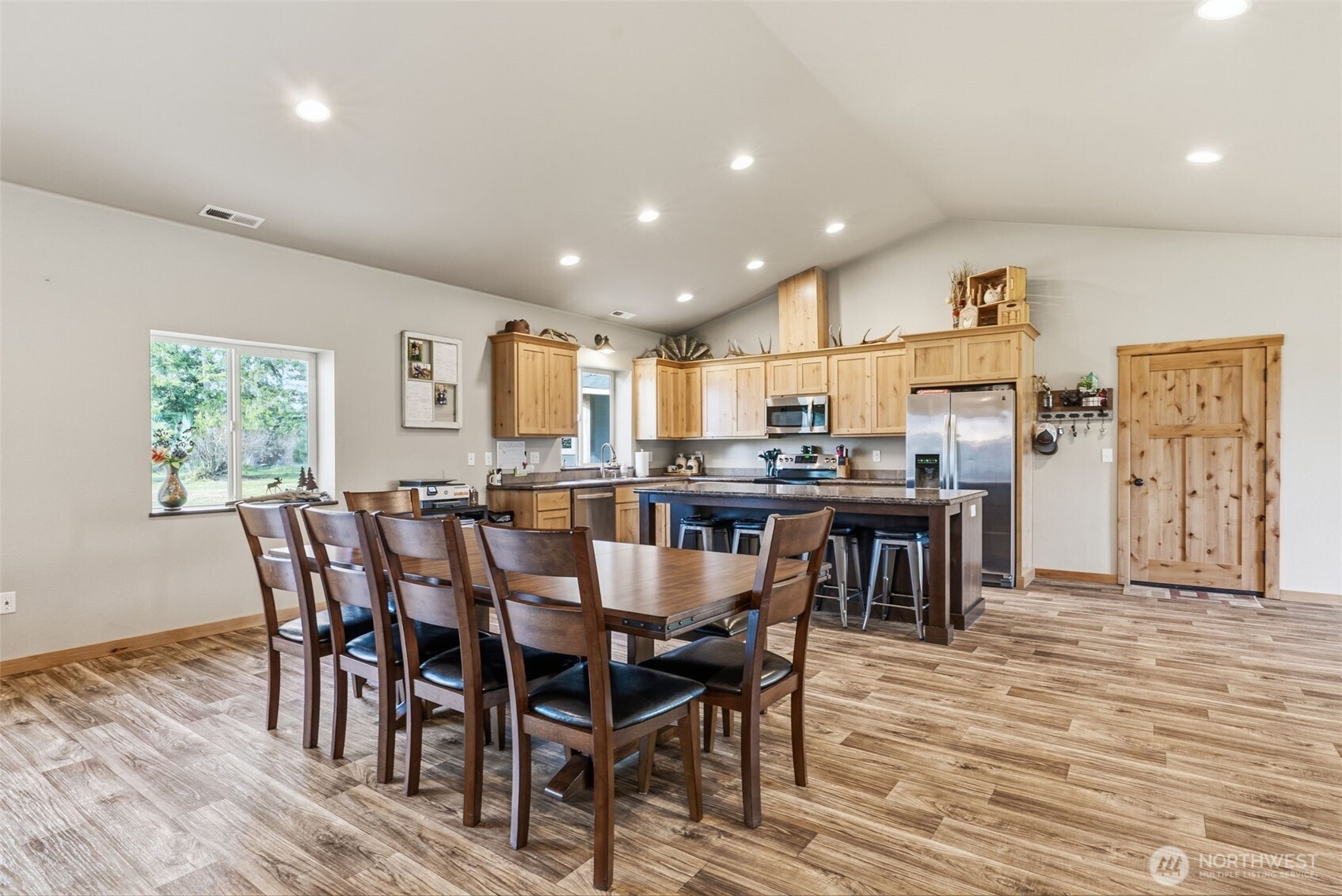 371 Toledo-Vader Road Toledo, WA 98591 - Photo 16 of 40 a view of a dining area with furniture and wooden floor