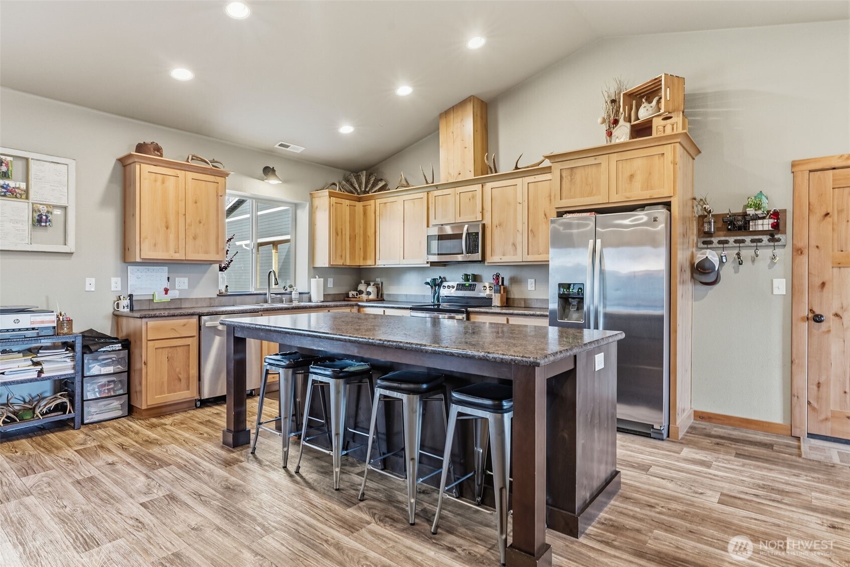 371 Toledo-Vader Road Toledo, WA 98591 - Photo 20 of 40 a kitchen with stainless steel appliances granite countertop a refrigerator a stove and a sink with cabinets
