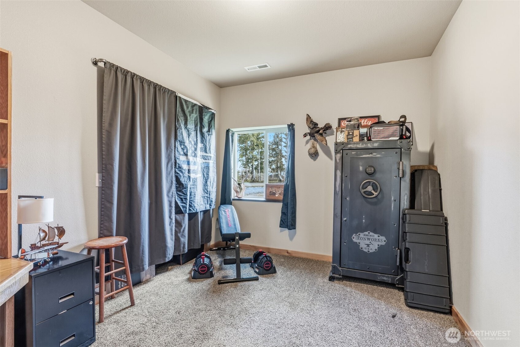 371 Toledo-Vader Road Toledo, WA 98591 - Photo 23 of 40 a living room with furniture and a window