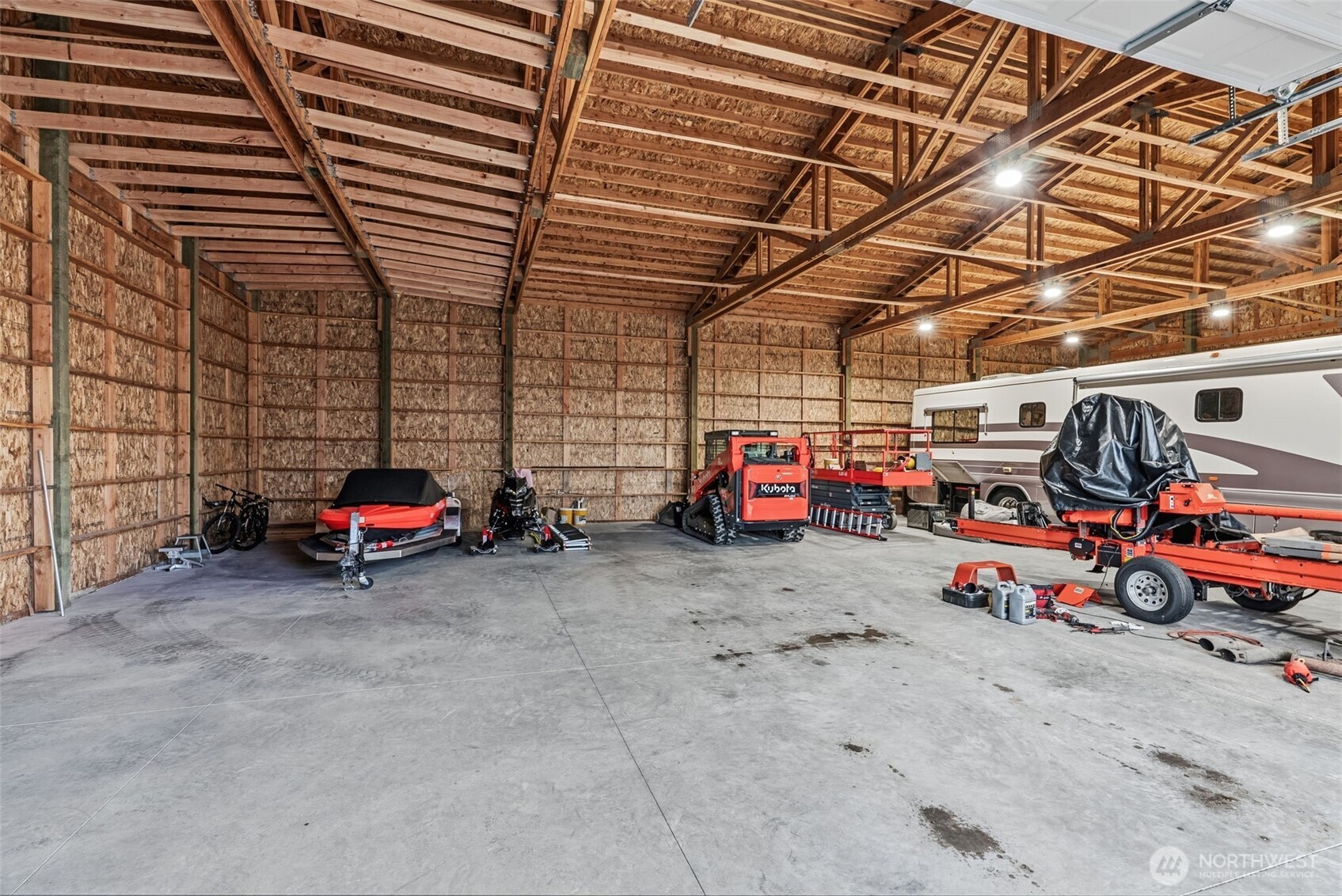 371 Toledo-Vader Road Toledo, WA 98591 - Photo 36 of 40 a view of parking garage with cars and other equipment