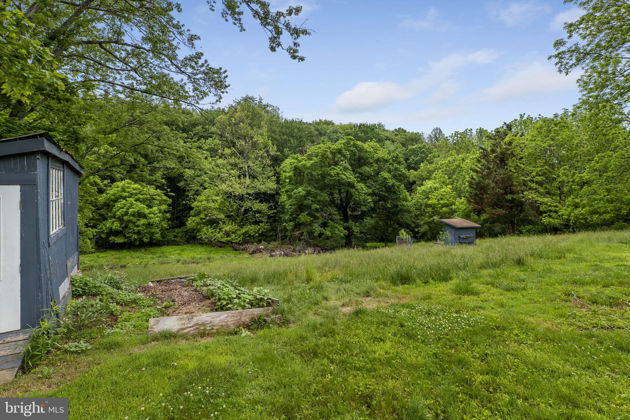 26001 Frederick Road Clarksburg, MD 20871 - Photo 40 of 46 a view of a lush green space