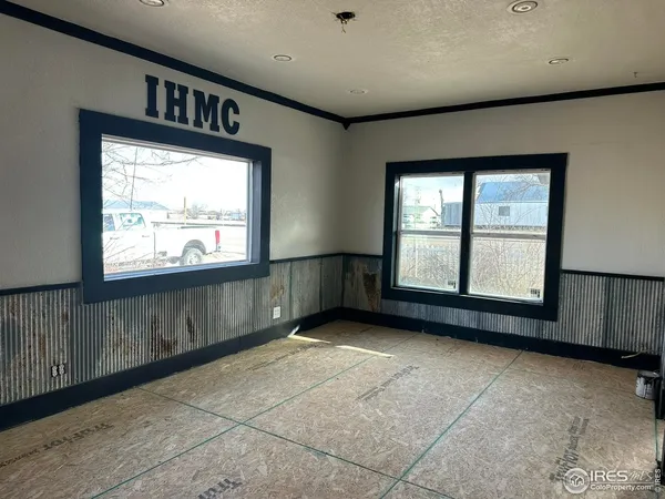 a kitchen with sink and window