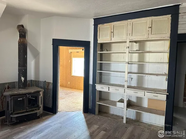 a view of a livingroom with furniture and windows