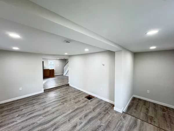 a kitchen with stainless steel appliances a refrigerator and a sink