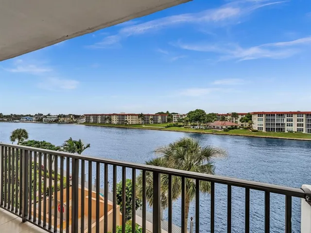 a view of a lake from a balcony