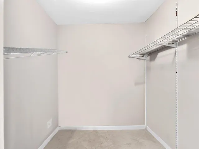 a view of a room with racks on the wall