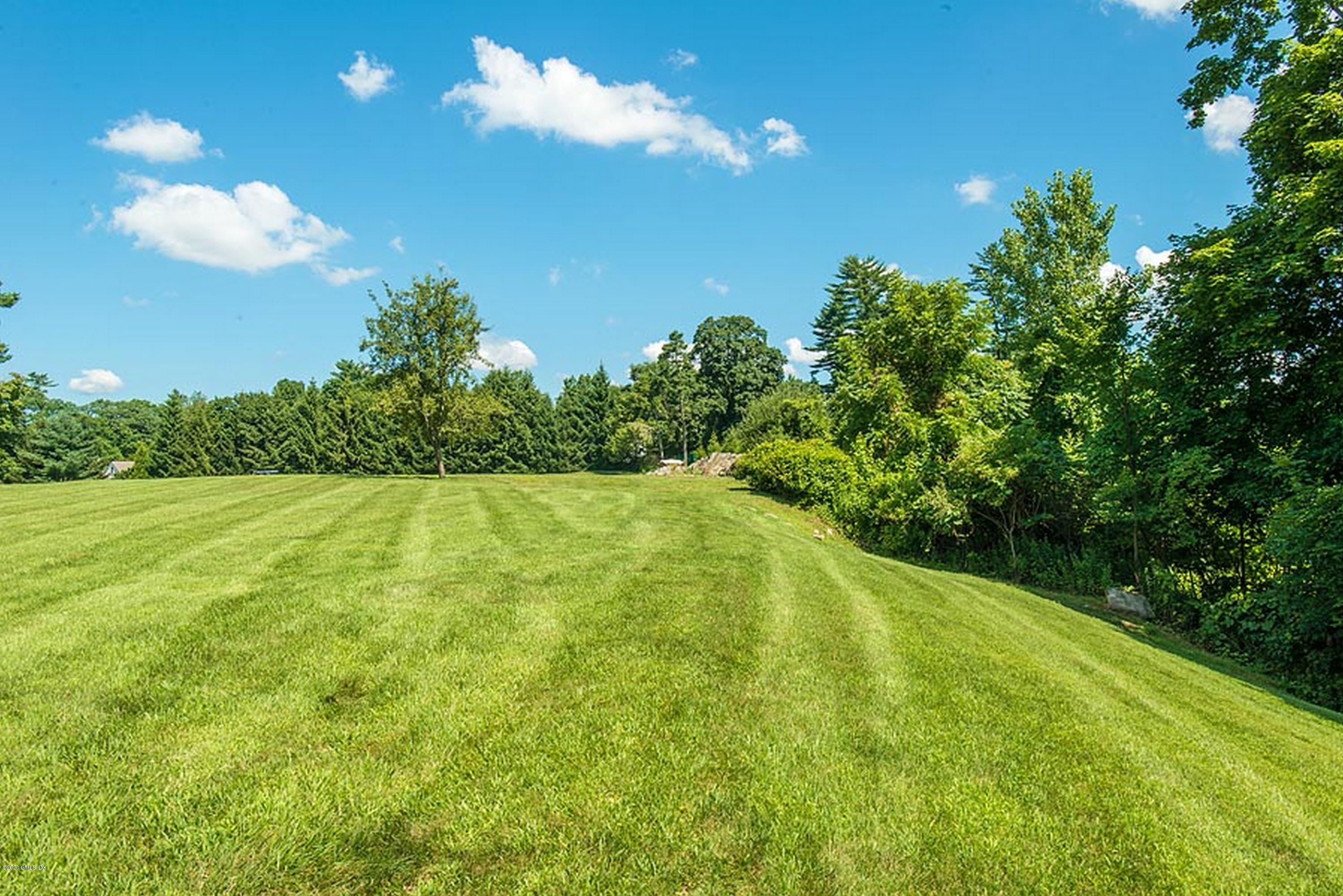 137 Doubling Road Greenwich, CT 06830 - Photo 3 of 12 a view of a golf course with green space