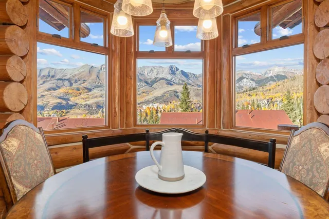 a kitchen with sink stove and cabinets