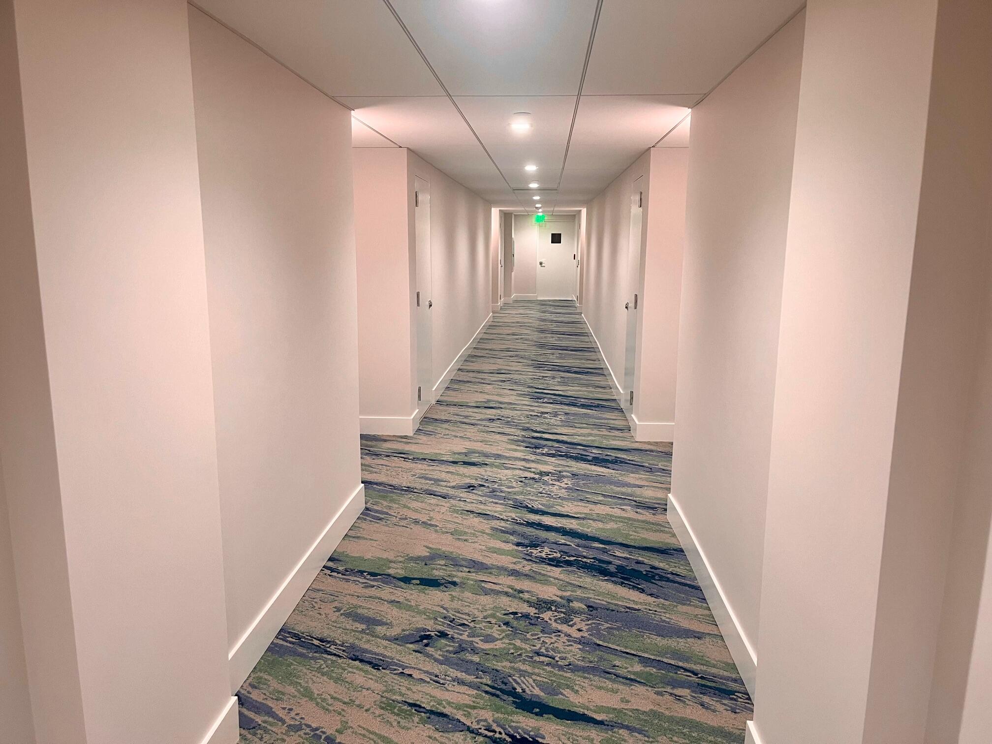 3400 North Ocean Drive, Unit 405 Riviera Beach, FL 33404 - Photo 14 of 27 Renovated hallways