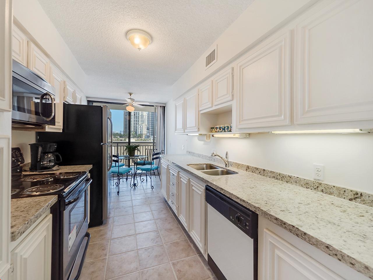 3400 North Ocean Drive, Unit 405 Riviera Beach, FL 33404 - Photo 5 of 27 Kitchen and breakfast nook
