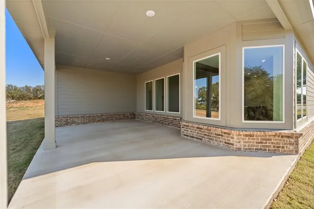 wooden floor and window in an empty room