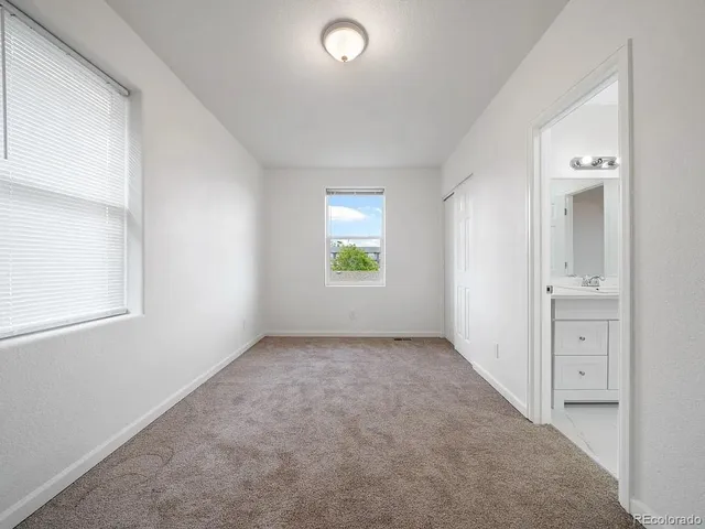 an empty room that has a window