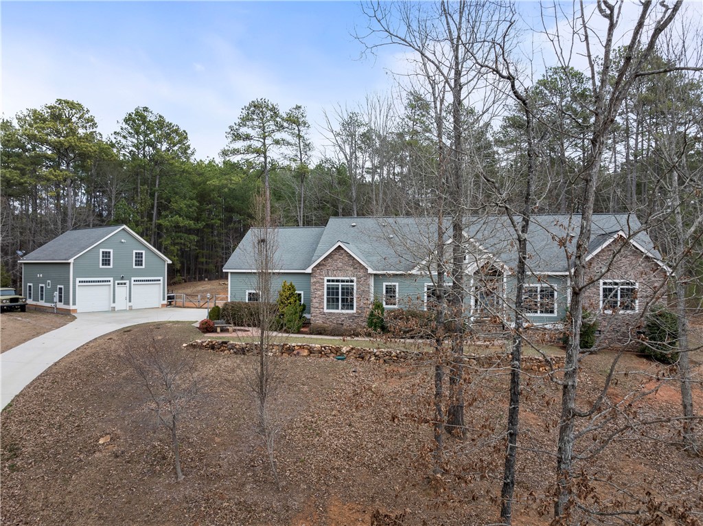 Single level home on large, beautiful wooded lot