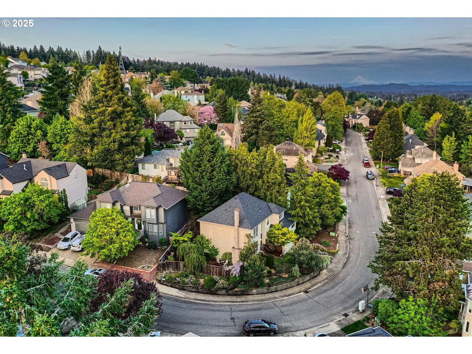 14525 Southwest Chesterfield Lane Portland, OR 97224 - Photo 30 of 31 an aerial view of a house with a garden and lake view