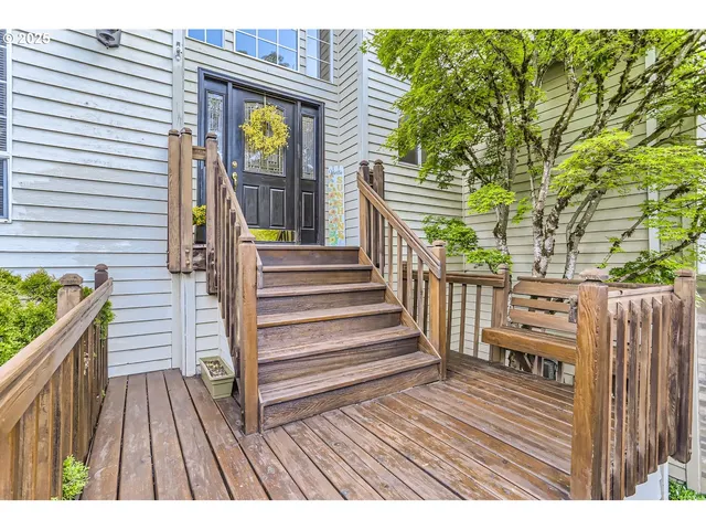 a view of outdoor space with deck and furniture