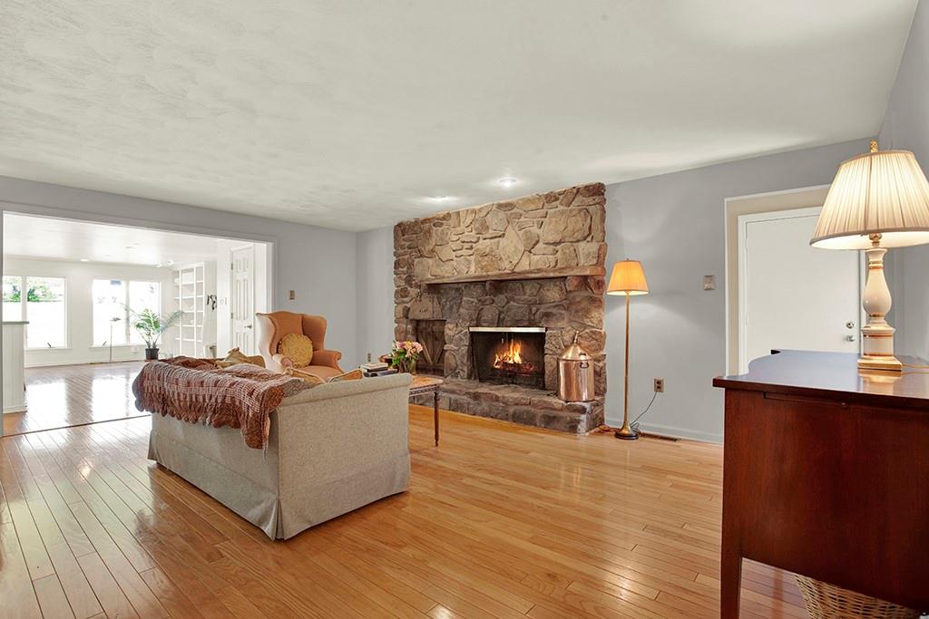 185 Barron Road Ligonier, PA 15658 - Photo 5 of 47 Living room with beautiful stone wood burning fireplace