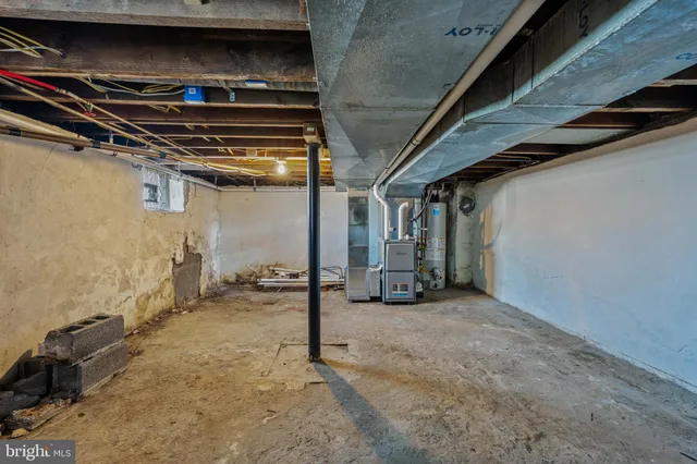 a view of a room with wooden walls