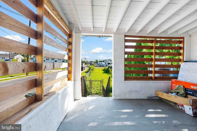 a lobby with furniture and window