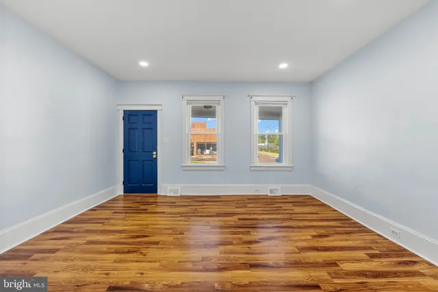 a view of an empty room and window