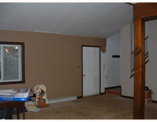 1890 Stoughton Road Slippery Rock, PA 16057 - Photo 3 of 18 Exterior Front. Living room Area unfinished floors. Walls need painted