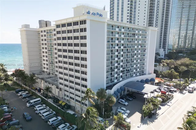 a view of a city with tall buildings