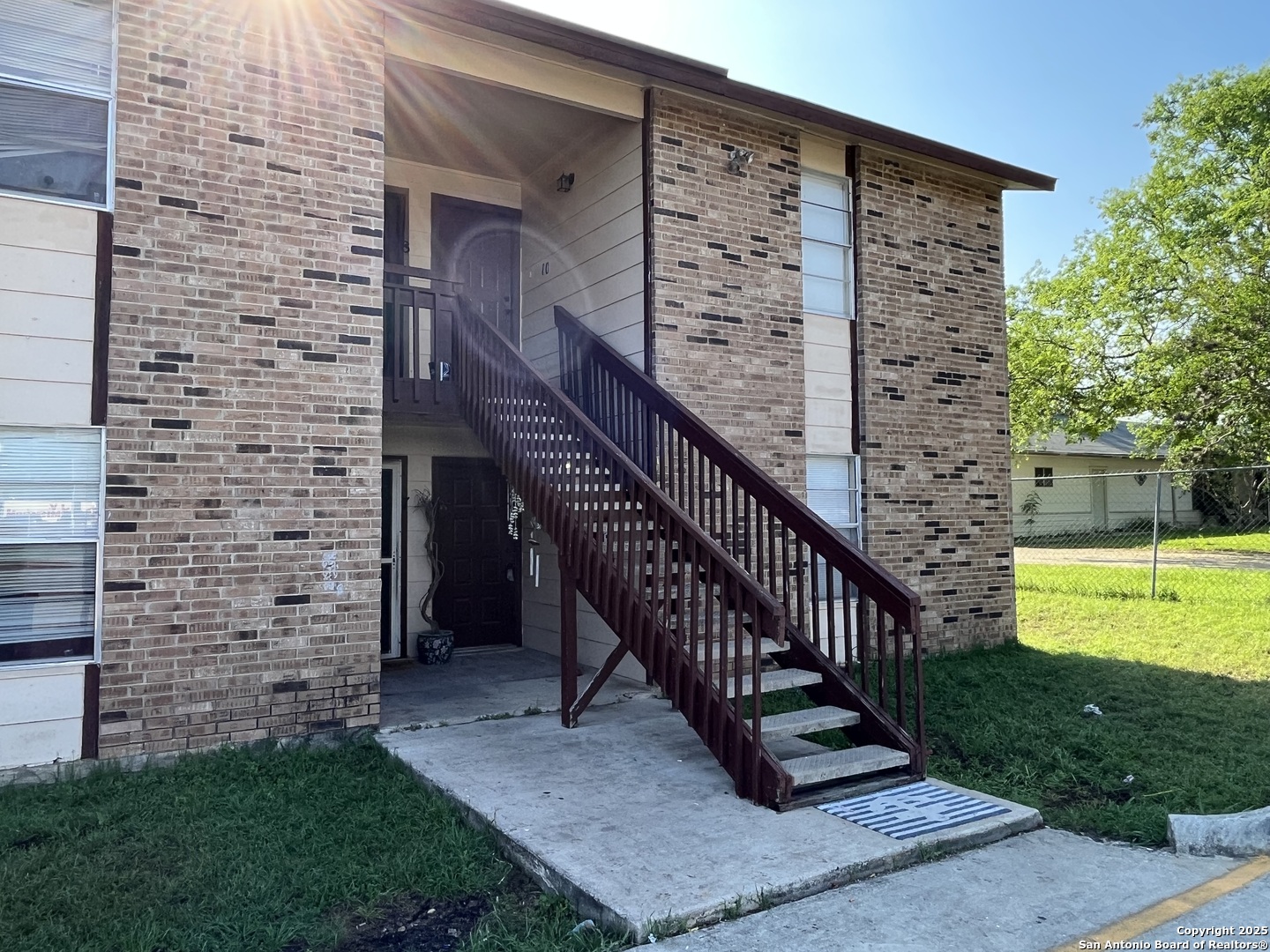 300 Moursund Boulevard, Unit 9 San Antonio, TX 78221 - Photo 1 of 10 a view of a wooden deck with a yard