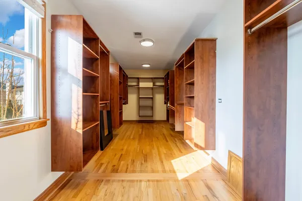 a view of a living room with a wooden floor
