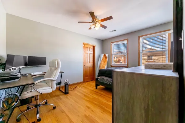 a workspace with furniture and a window