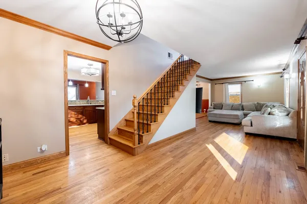 a view of a livingroom with furniture and wooden floor