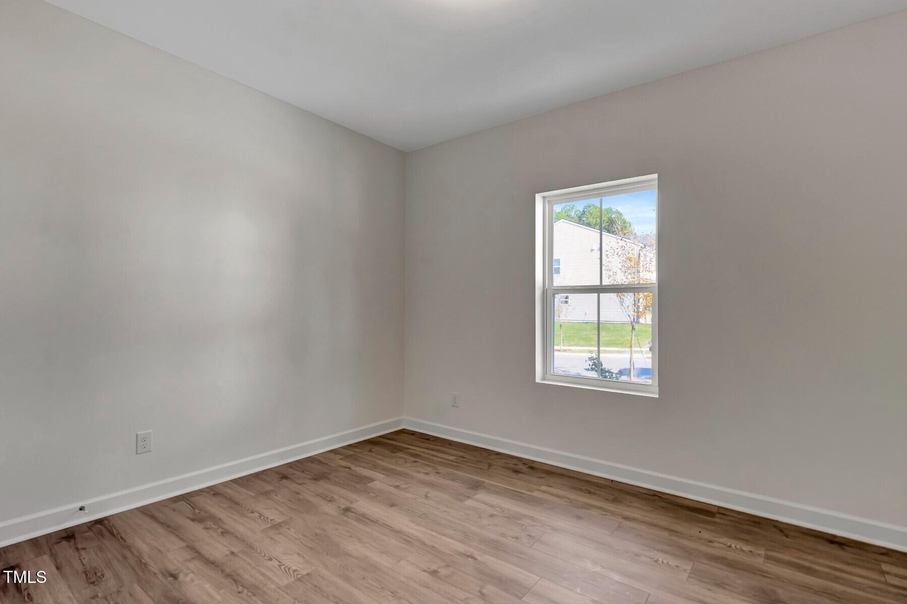 4401 Gehrig Lane, Unit 22 Raleigh, NC 27616 - Photo 16 of 35 an empty room with a window