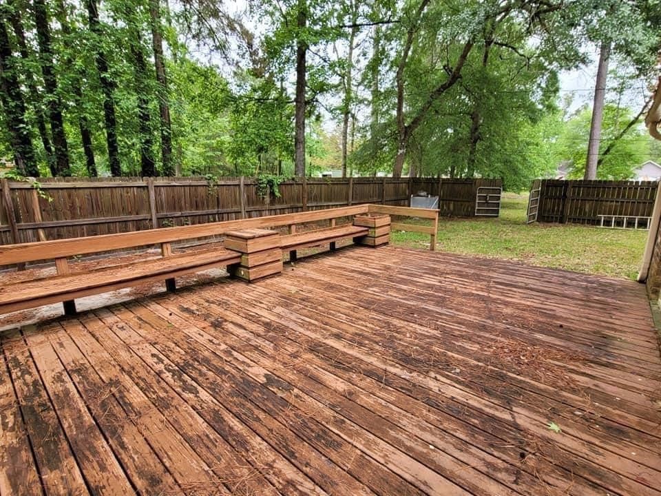 123 Pinehurst Drive Sour Lake, TX 77659 - Photo 19 of 23 a backyard of a house with lots of green space and wooden fence