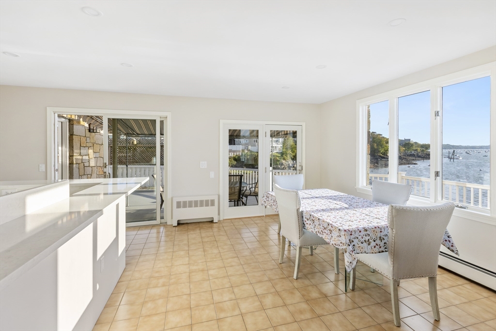89 Naugus Avenue Marblehead, MA 01945 - Photo 14 of 39 a dining room with furniture and windows