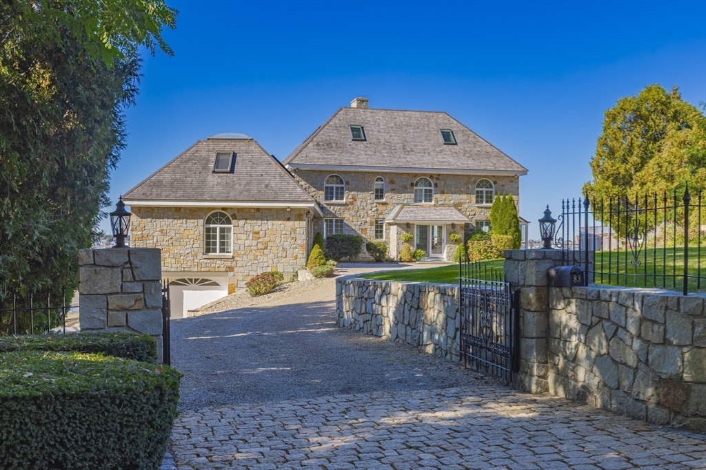 89 Naugus Avenue Marblehead, MA 01945 - Photo 29 of 39 a front view of a house with garden