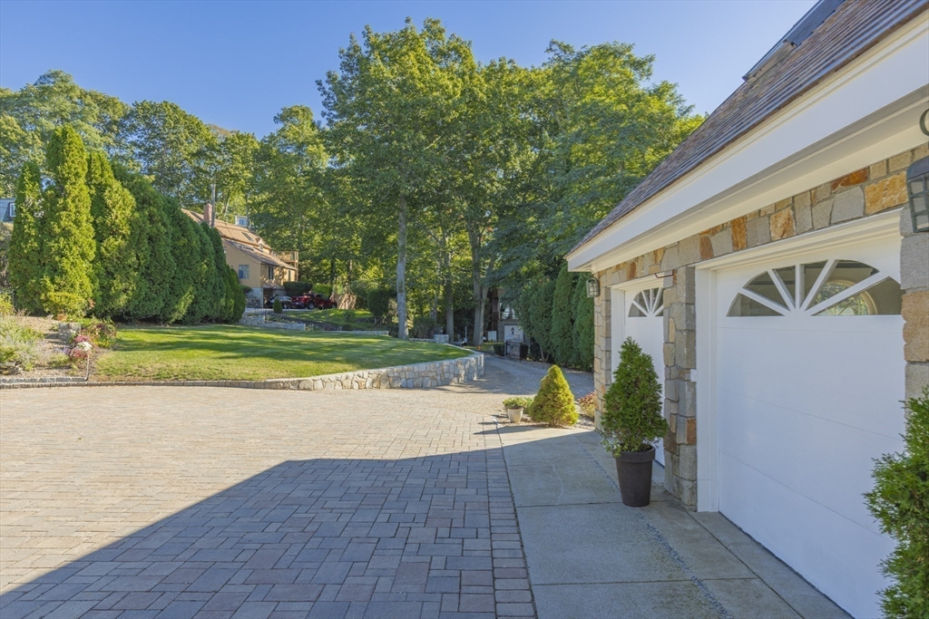 89 Naugus Avenue Marblehead, MA 01945 - Photo 33 of 39 a view of a house with a swimming pool