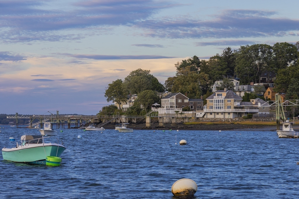 89 Naugus Avenue Marblehead, MA 01945 - Photo 36 of 39 a view of a house with a swimming pool