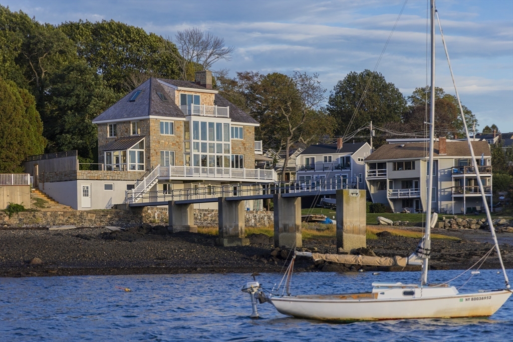89 Naugus Avenue Marblehead, MA 01945 - Photo 38 of 39 a front view of a house with a yard