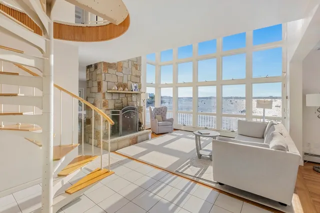 a kitchen with stainless steel appliances a sink and cabinets