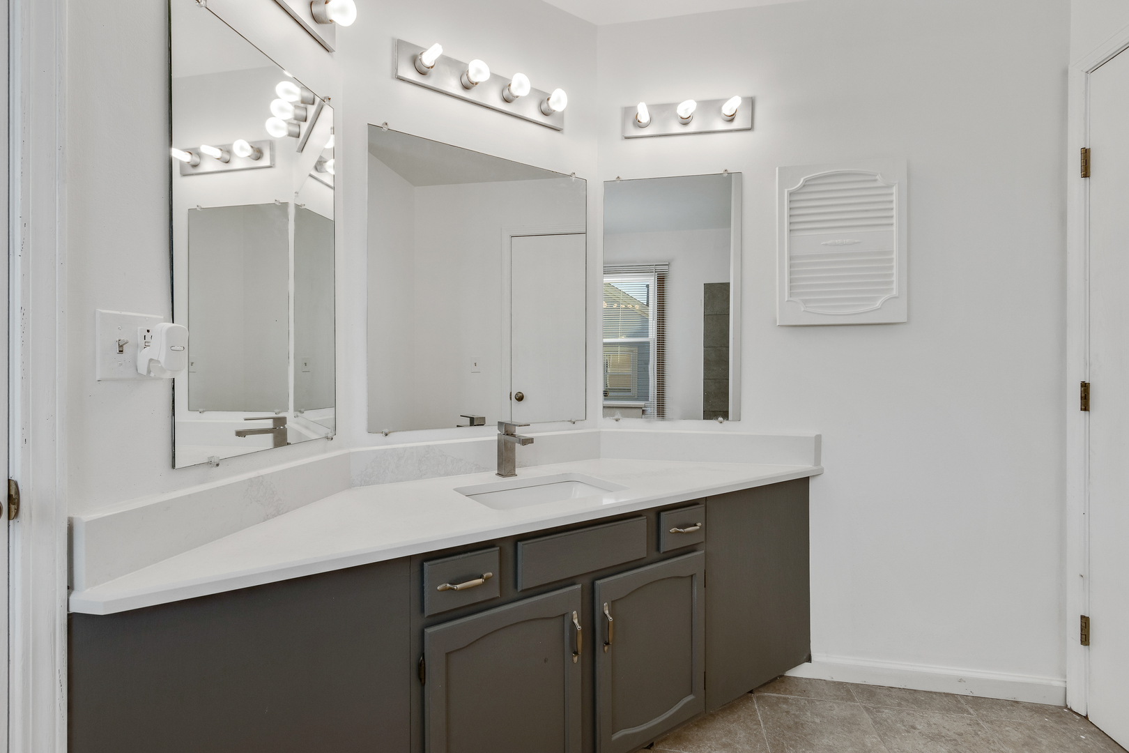 68 Jackson Lane Streamwood, IL 60107 - Photo 17 of 25 a bathroom with a sink double vanity and a mirror