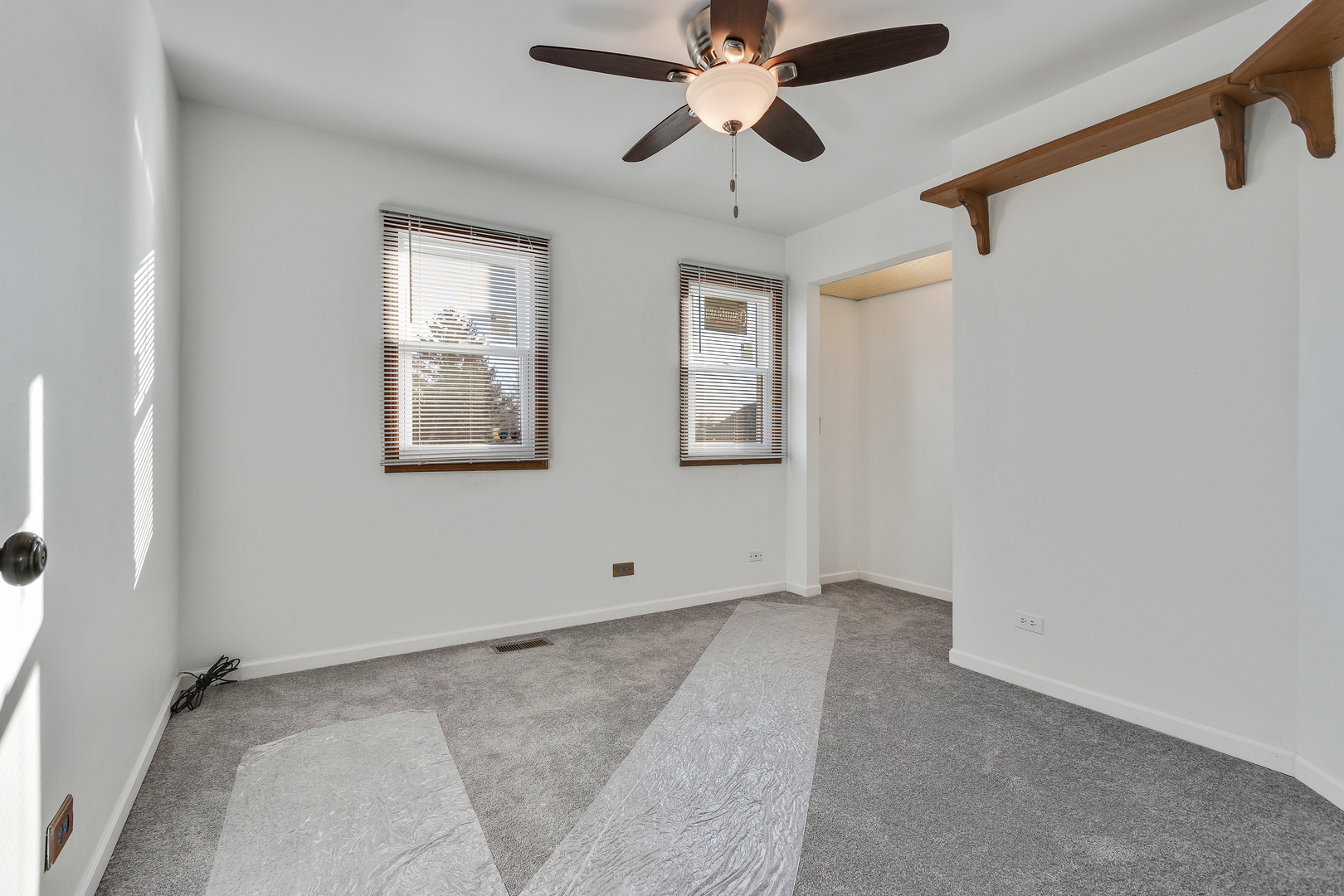 68 Jackson Lane Streamwood, IL 60107 - Photo 21 of 25 a view of an empty room with a window